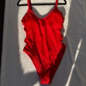 NEW NEVER WORN LOOPED SIDES RED SWIMSUIT